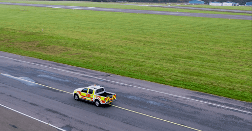 Aerial photo of London Biggin Hill Airport with Airfield Safety vehicle
