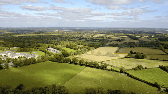 UAS zone partially covering part of country estate with fields and estate house