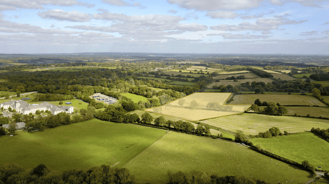 UAS zone partially covering part of country estate with fields and estate house