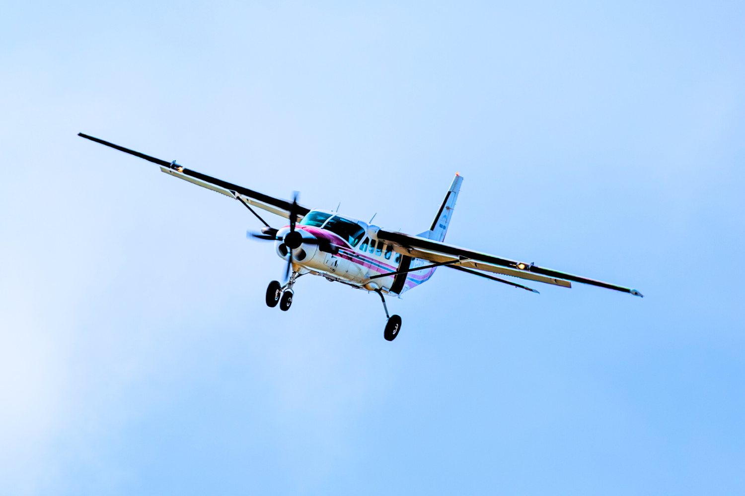 small aircraft flying in sky